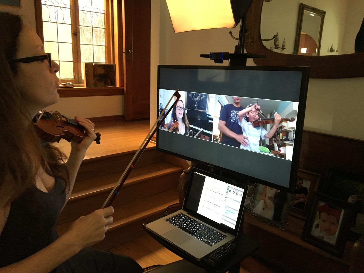 A student taking a GoToLesson online music lesson
